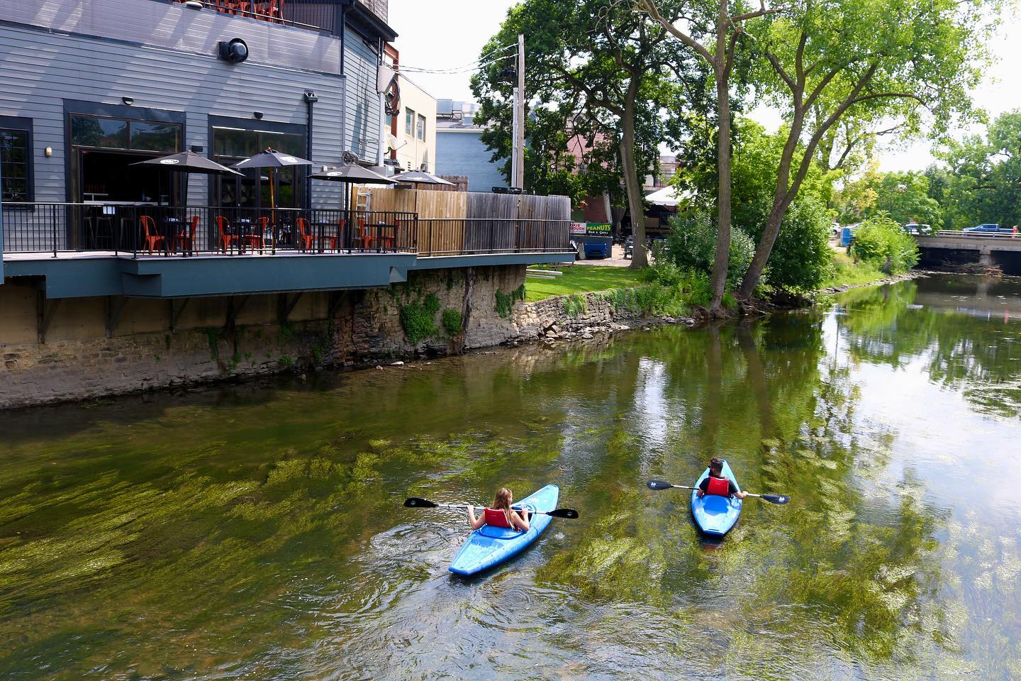 Downtown Naperville: from the water! Join us this weekend. 🛶www.napervillekayak.com